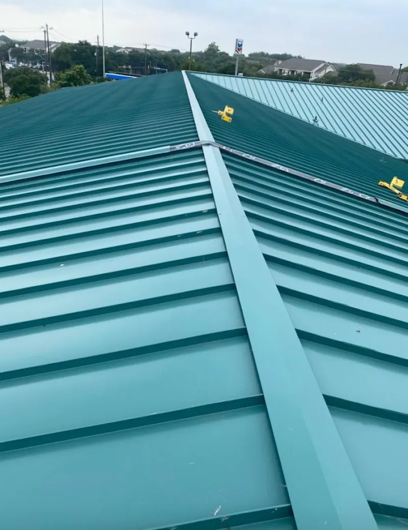 Green commercial metal roof ridge and valley for Metal Roof Repair in Harvest